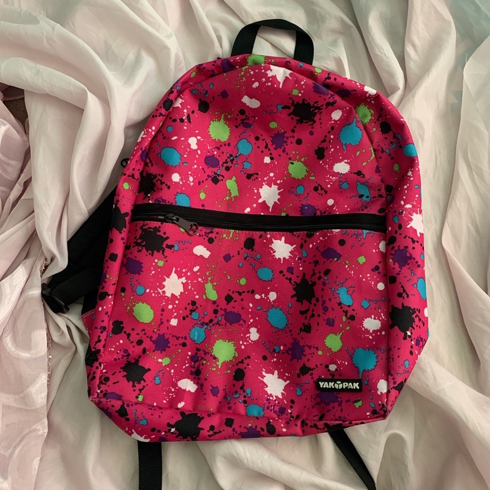 pink paint splattered backpack
